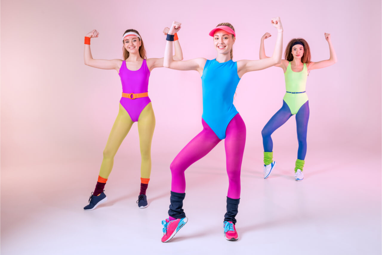 three women wearing aerobic oufits